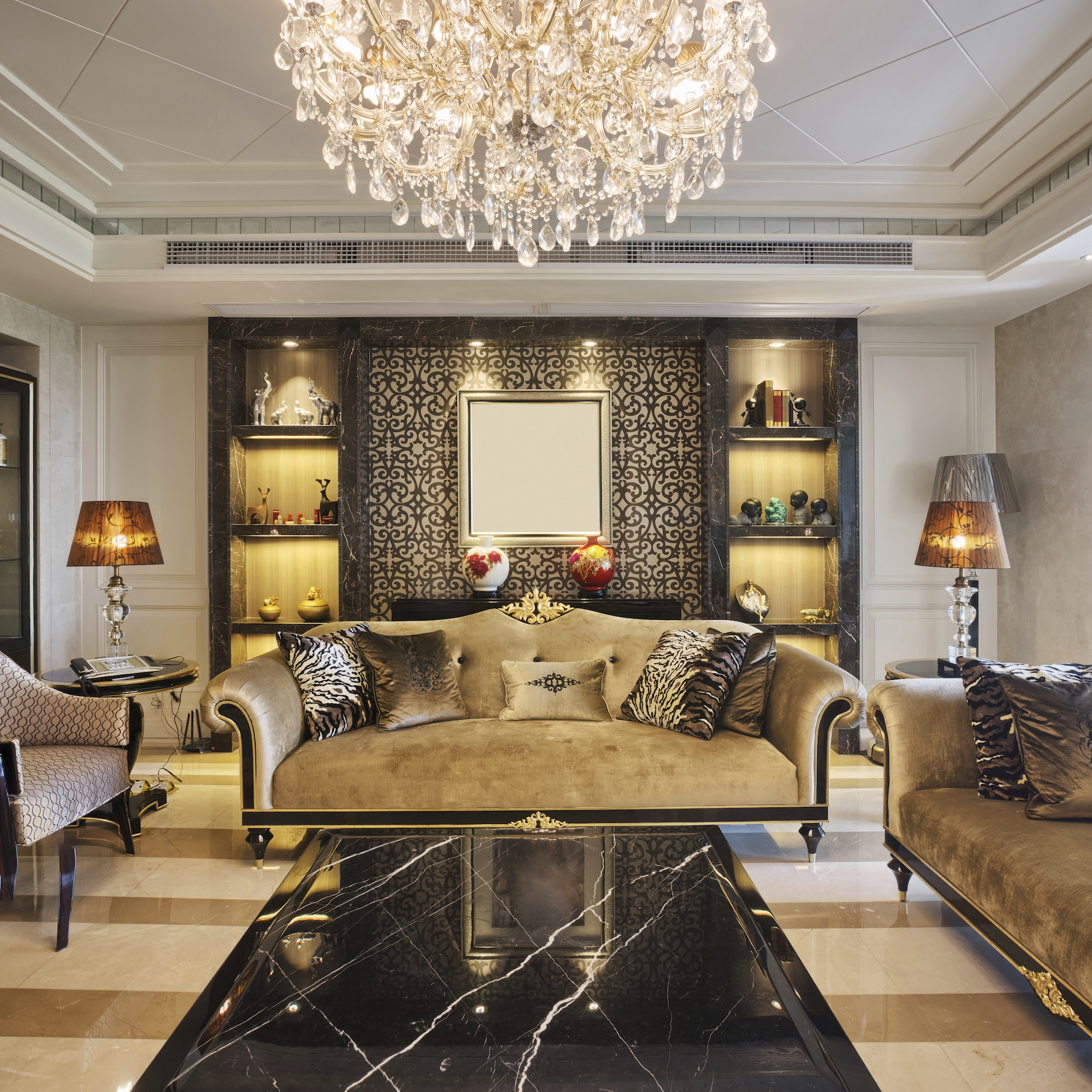 A luxury living room interior with chandelier.
